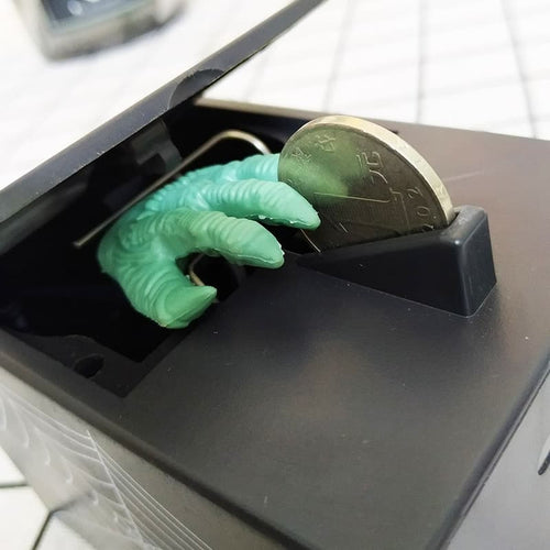 Automatic Scary Monster Hand Coin Box™