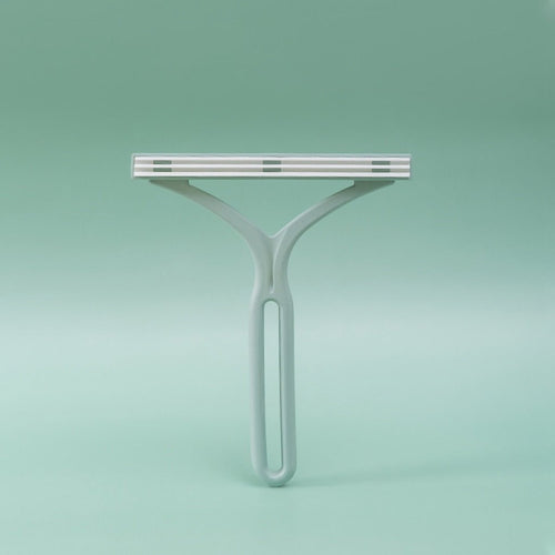 Double-ended manual lint eliminator™
