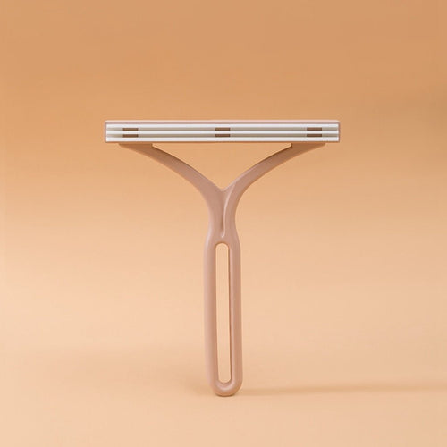 Double-ended manual lint eliminator™